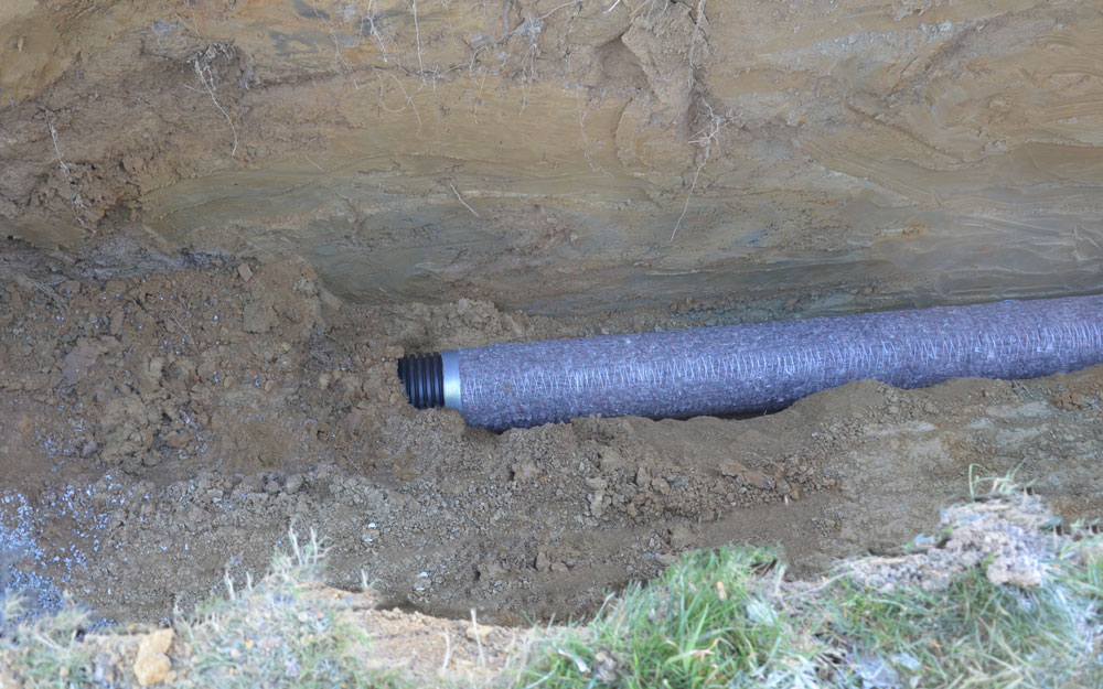 Drain_routier_enrobe_TECHNIDRAIN_chantier_drainage_remblaiment